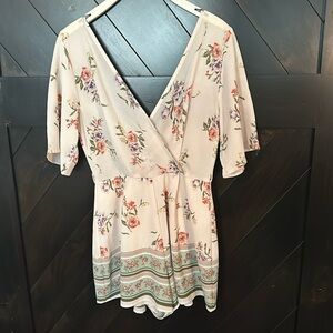Trixxi Clothing Company creme with floral print romper